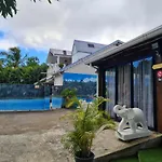 Bungalow de 2 chambres avec piscine partagee jacuzzi et jardin clos a Le Moule